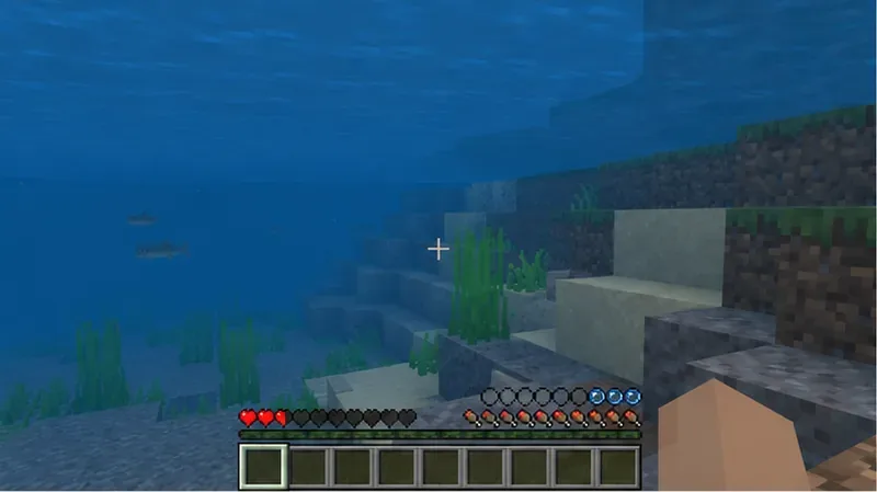 Underwater Bedrock gameplay with the oxygen bubbles nearly depleted, showing the normal situation in which drowning damage can occur.