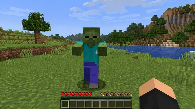 ซอมบี้ตัวหนึ่งยืนอยู่ห่างจากผู้เล่นไม่มากนักในโลก Minecraft ที่ค่อนข้างโล่ง แสดงให้เห็นถึงการทดสอบตัวเลือกแบบควบคุม