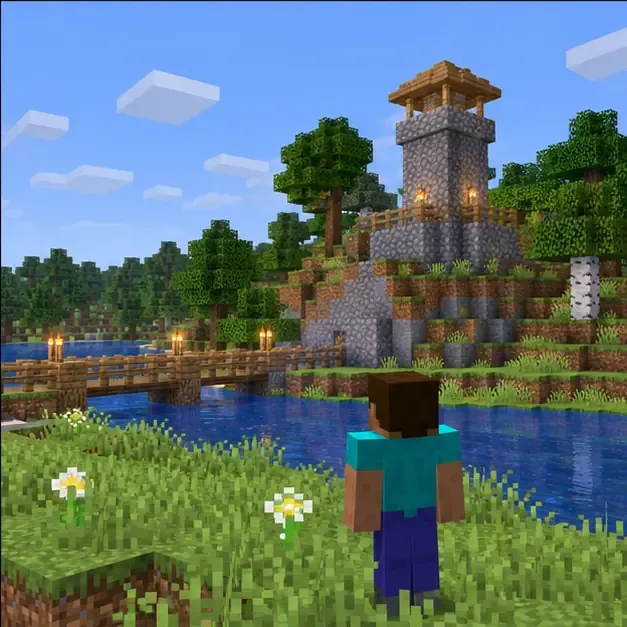 Player on a grassy riverbank facing a stone watchtower and a wooden bridge