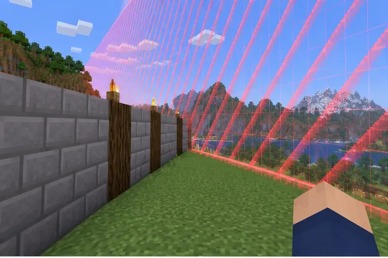 A translucent red grid world border crossing a grassy Minecraft build site beside a stone wall.
